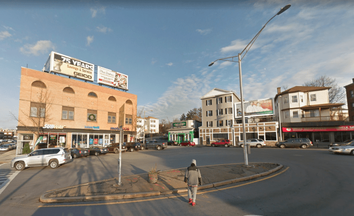 A December 2016 Google Street View image of Kelley Square in Worcester, looking north towards Water Street and the Canal District.