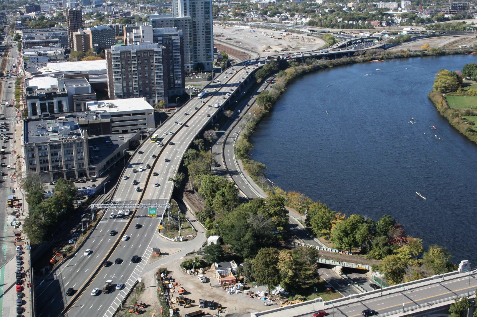 An aerial view of the "throat" section of Interstate 90 near Boston University, looking west toward the vacant former railyards where Harvard University aims to develop a new urban neighborhood of housing, office and lab space. Courtesy of MassDOT.