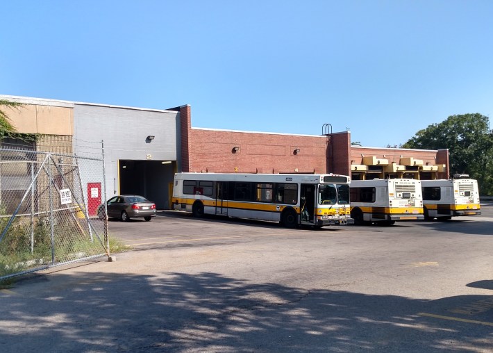 The MBTA's Quincy bus maintenance garage was originally built in the early years of the Great Depression. Photo by Wikimedia Commons user Pi.1415926535, licensed under Creative Commons.