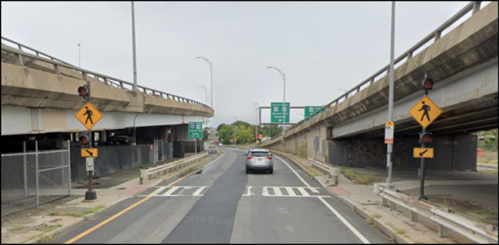 Somerville and MassDOT officials are working on plans to improve safety at this MBTA route 95 bus stop on the eastbound lanes of Mystic Avenue near Assembly Square. Preliminary plans suggest reducing Mystic Ave. to one lane on this block and providing a curb extension to shorten the pedestrian crossing to the Kensington pedestrian underpass.