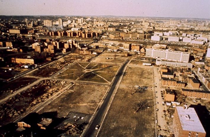 An aerial view of the former Madison Park, looking west towards the modern-day site of the Ruggles Orange Line station. Bulldozers cleared entire city blocks in Roxbury to make way for the Inner Belt interstate highway, which was later replaced by Melnea Cass Boulevard. Photo courtesy of the Cambridge Historical Society.