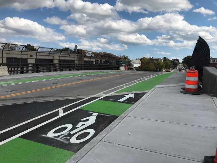 The new Broadway overpass in Ball Square is open to traffic, with buffered bike lanes.