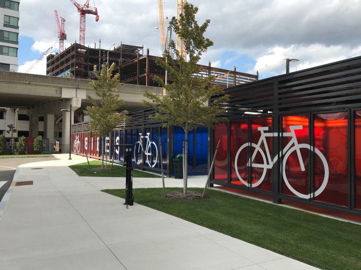 The new "Hult House" apartment building, located next to the Gilmore Bridge, includes two large sheds for secure bike storage, plus a public repair station, just a block away from the Community Path near North Point Park.