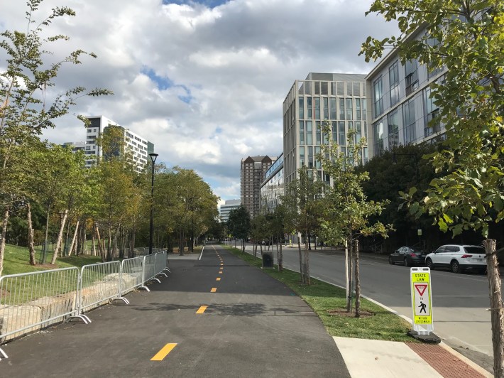 The new Community Path through the Cambridge Crossing development traverses the edge of a new public park (at left) on its way to North Point Park.