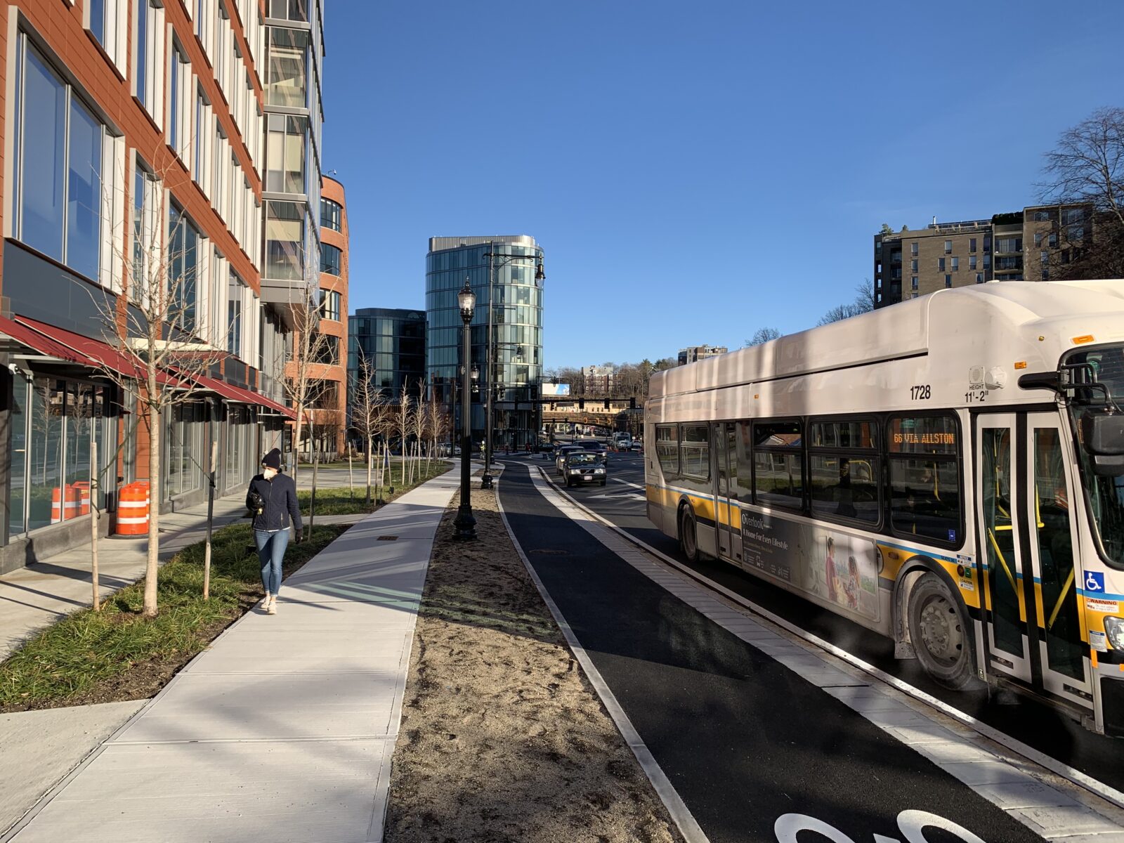 Washington Street in Brookline with new sidewalks and protected bike lanes.