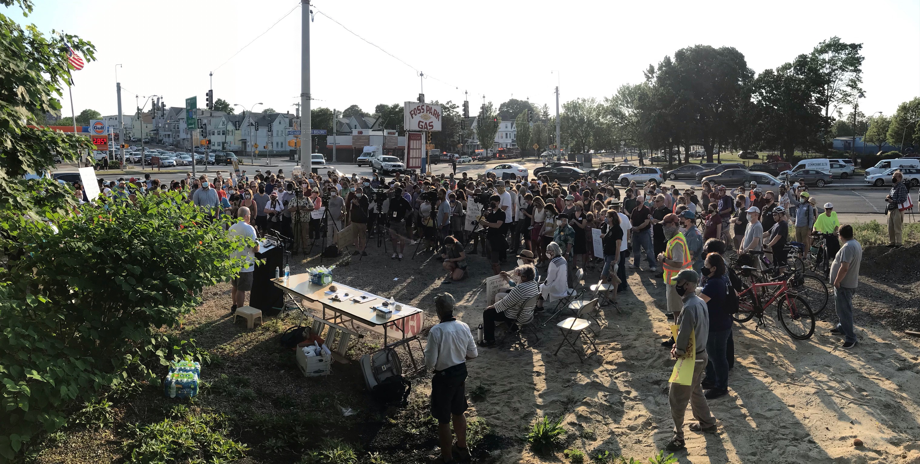 Advocates and elected officials gathered at an abandoned gas station on May 26, 2021 to memorialize victims of traffic violence in the area and demand immediate safety improvements to nearby roadways, including Mystic Ave. and the McGrath Highway.