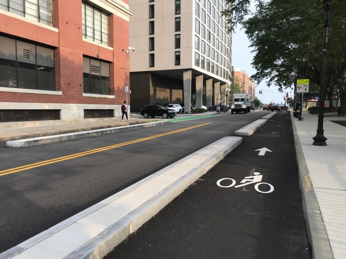 Dorchester Ave. protected bike lanes near Broadway