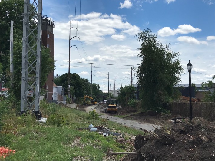 Trail construction is underway in Everett to extend the Northern Strand path south to the Mystic River waterfront.