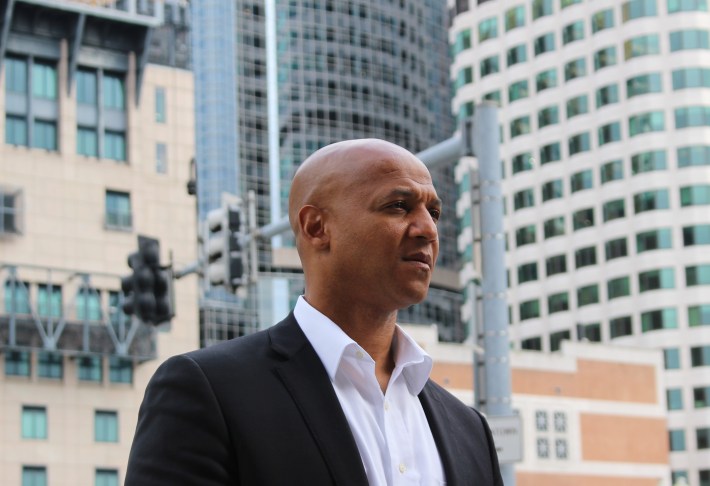 John Barros, candidate running to be Boston's next mayor, outside South Station in downtown Boston.