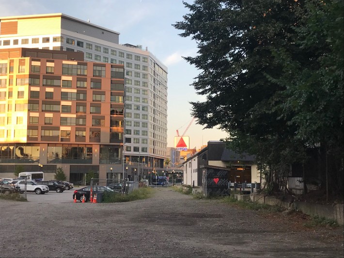 A future phase of the Fenway multi-use path will continue along this abandoned right-of-way to Overland Street, one block away from Fenway Park. This is the view of the future path from near Miner Street, looking northeast towards Kenmore Square.