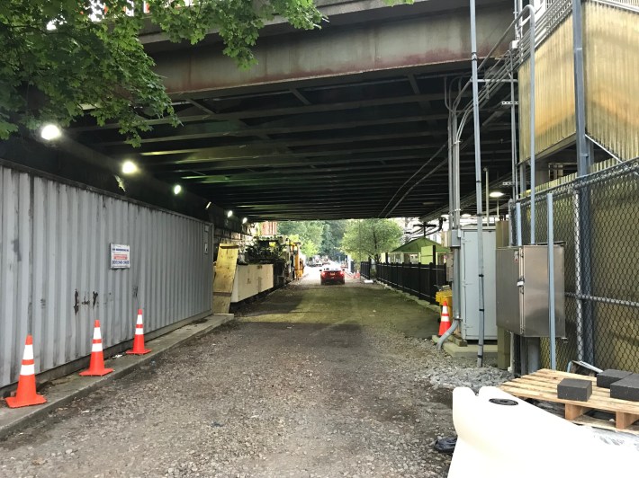 This wide, MBTA-owned corridor extends below Park Drive, and could someday connect to the Riverway path network. For now, though, a fence blocks access, and bikes and pedestrians must detour to the south to cross the hectic Park Drive rotary at street level.