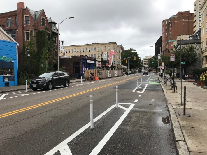 New separated bike lanes on Massachusetts Avenue near Hancock Street in Cambridge.