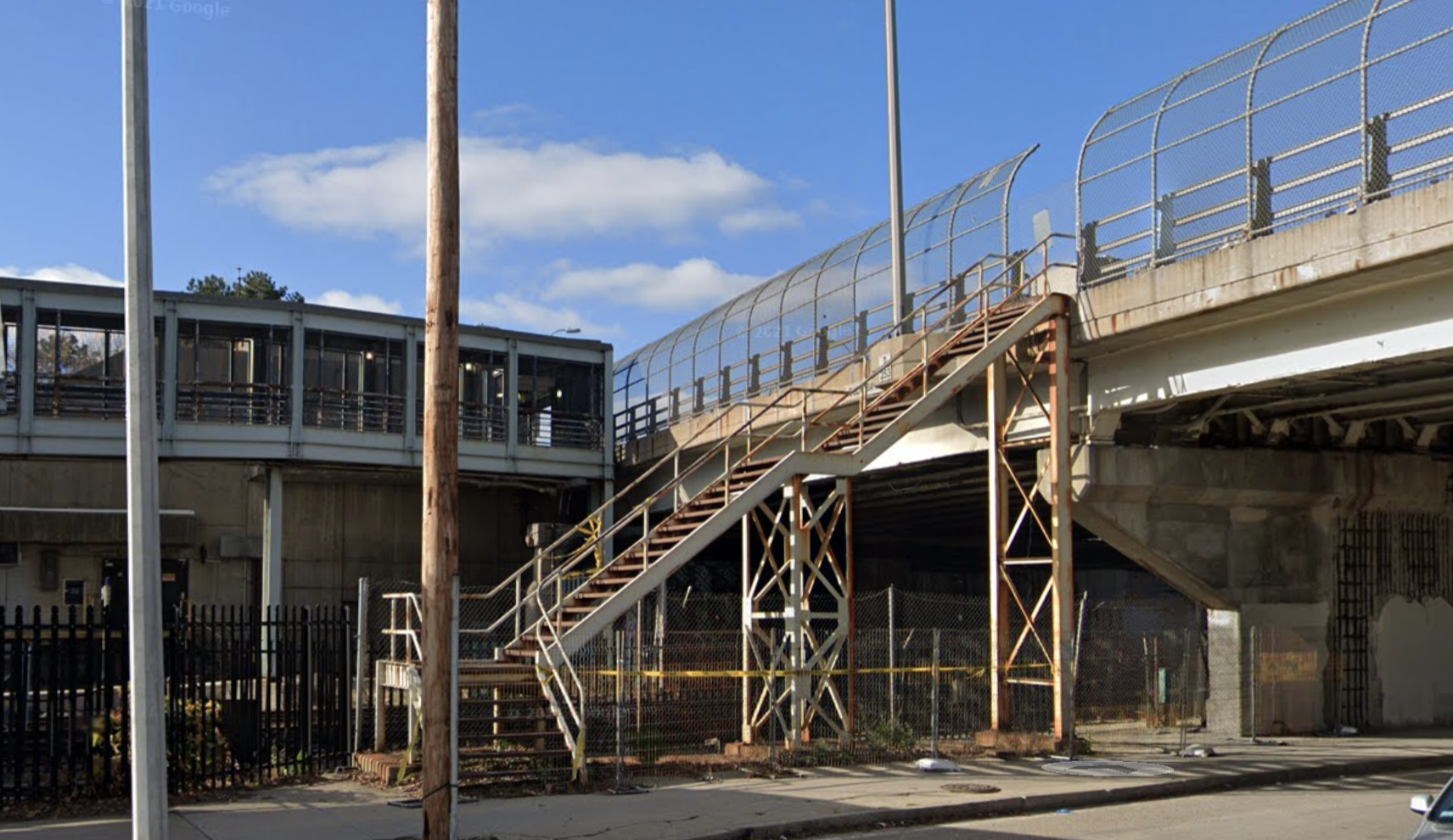 A crumbling DCR-owned stairway leads to Columbia Road from the JFK/UMass station