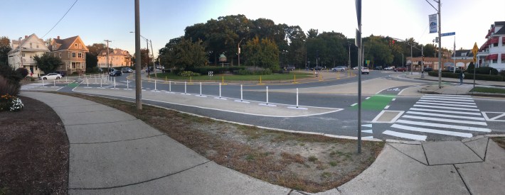 The newly reconfigured Powder House Circle features shorter crosswalks, protected bike lanes around the edge of the circle, and narrower car lanes.