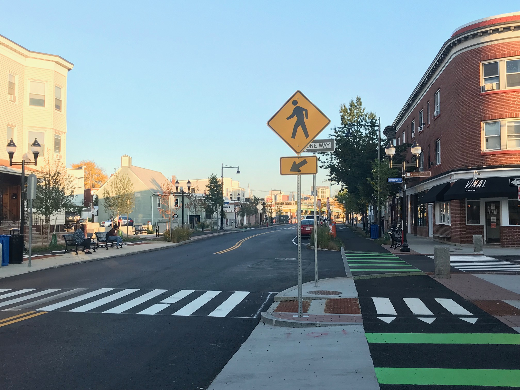 Somerville Ave. features sidewalk-level protected bike paths in each direction, new stormwater collection gardens, and improved sidewalks and crosswalks.