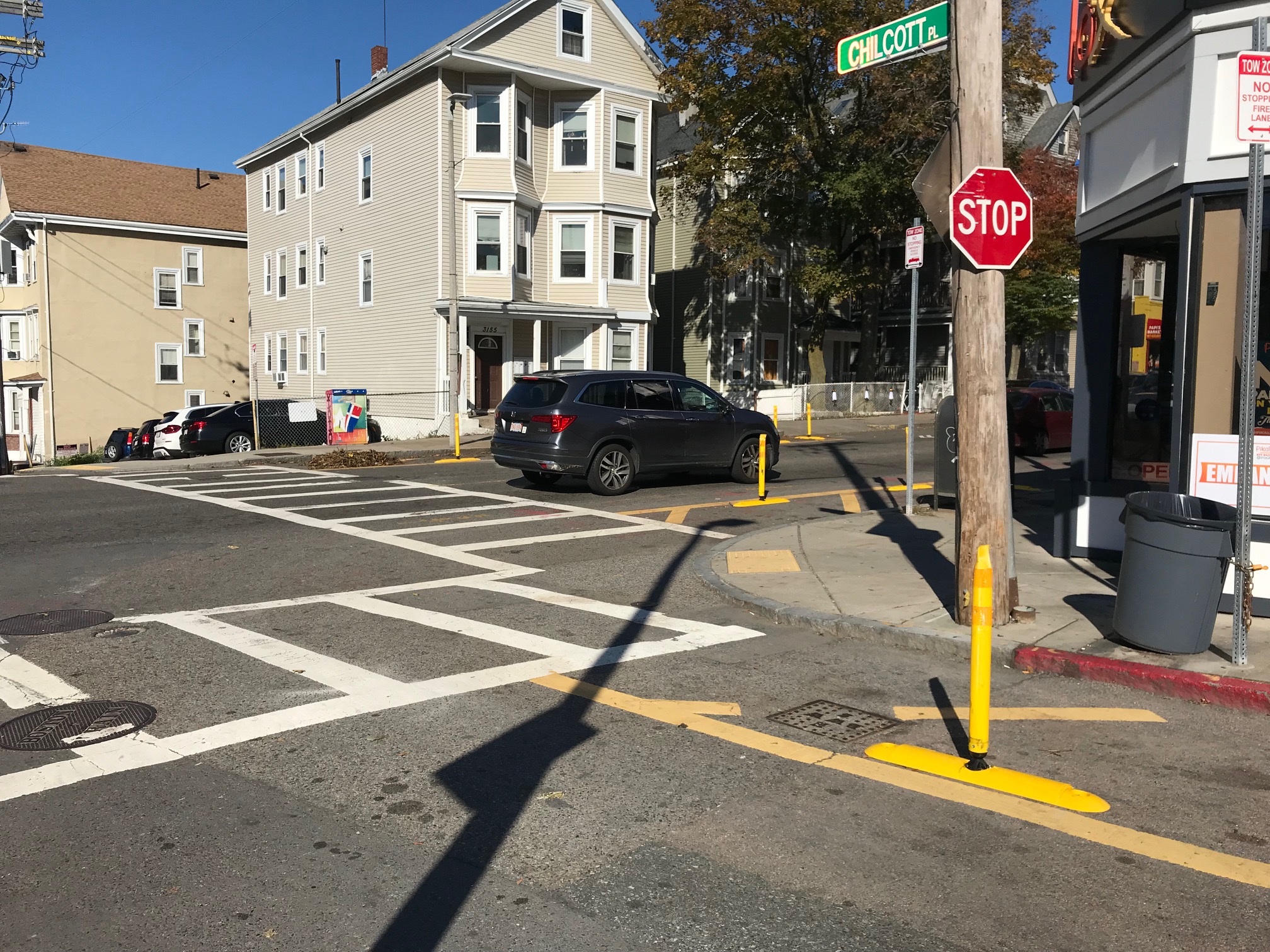 New flexible post bollards keep cars away from crosswalks at the intersection of Washington Ave. and Chilcott Pl. near Egleston Square in Roxbury.