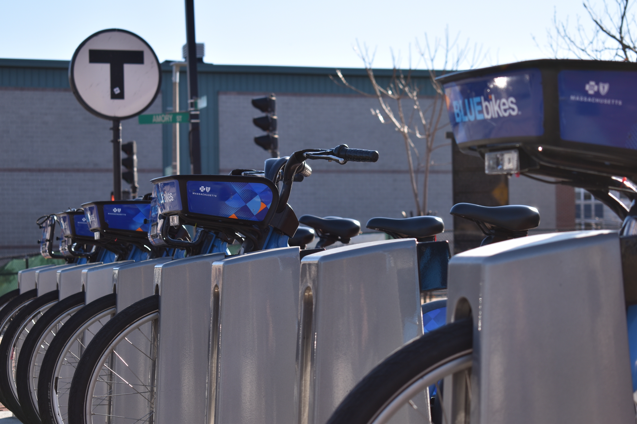 A Bluebikes dock at the Green Street Orange Line station in Jamaica Plain.