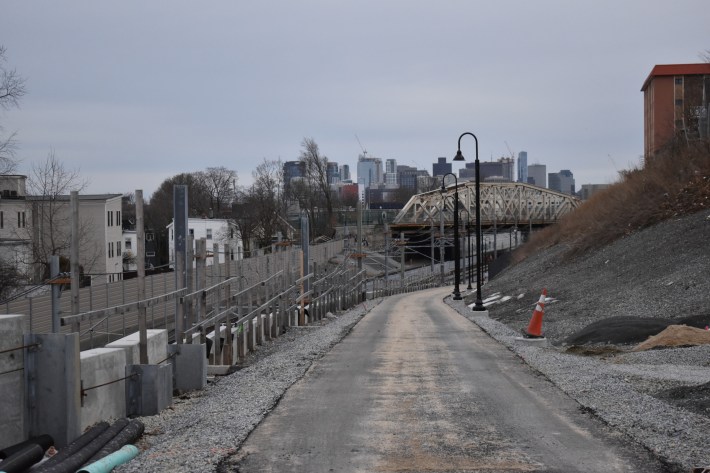 A view of the new Community Path, still under construction, looking toward downtown Boston from the Walnut Street bridge.