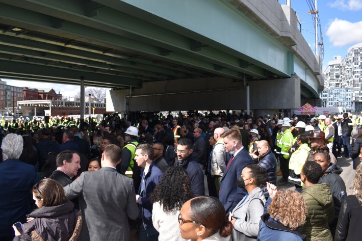 A large crowd gathered under the Lechmere Station viaduct for the Green Line Extension opening festivities.