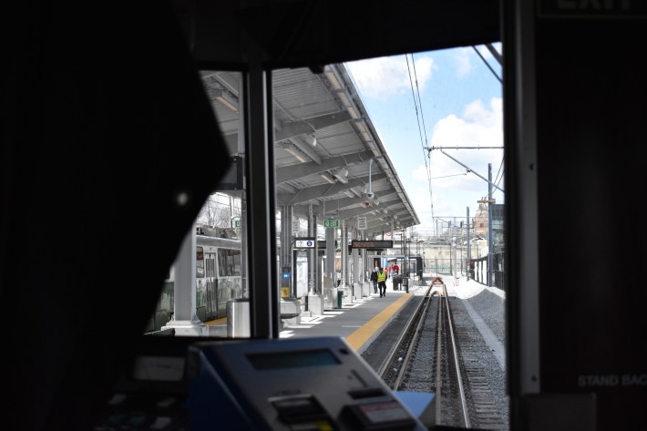 A view out the front of a Green Line train as it arrives at Union Square station in Somerville.