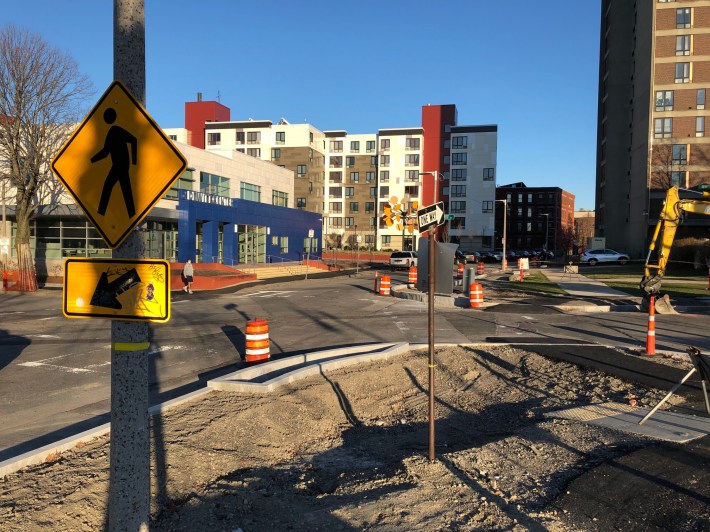 New curbs delineate a future raised intersection between Ruggles and Dewitt Street in Roxbury.