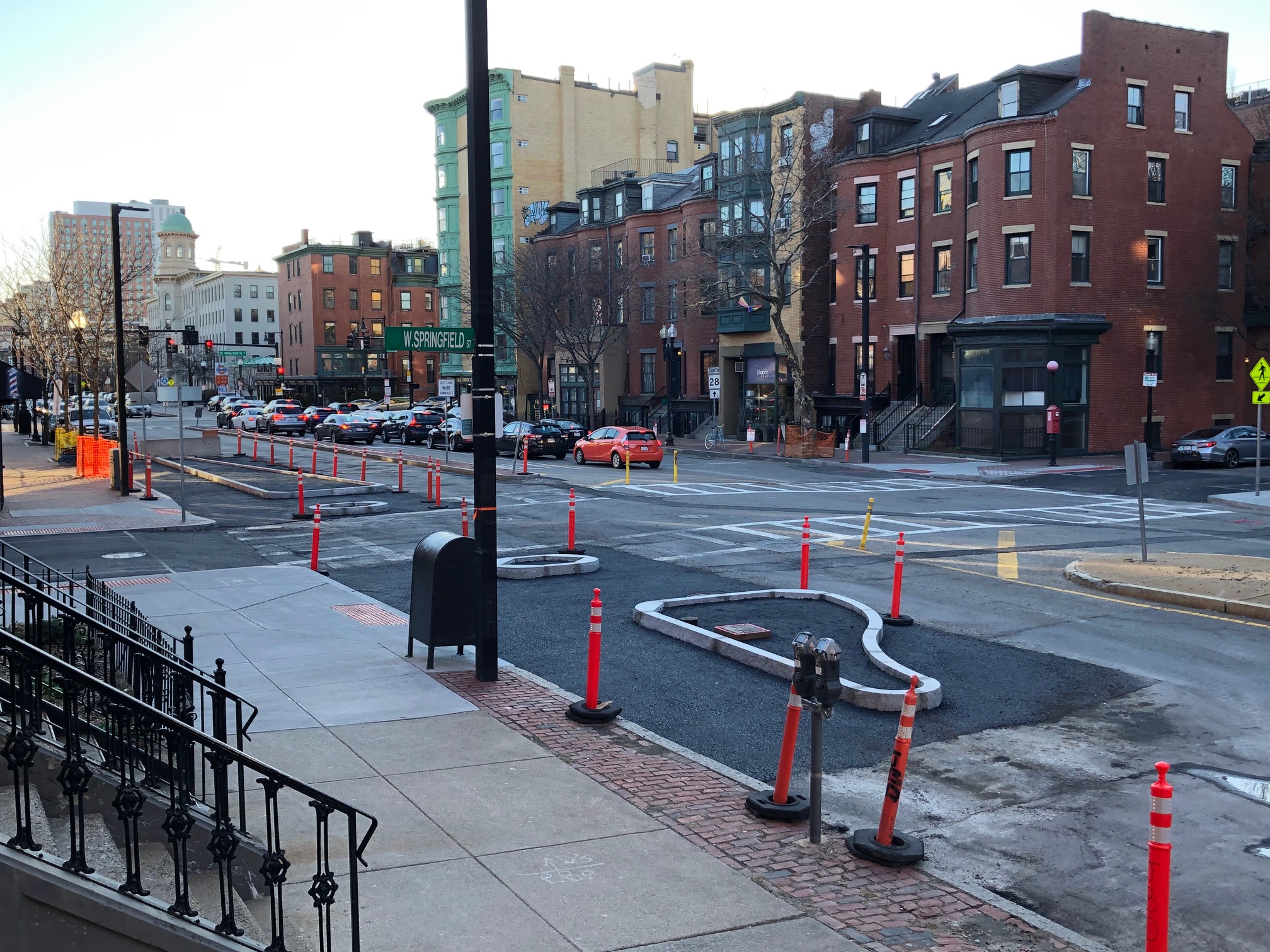 Realigned curbs under construction at the intersection of Tremont Street and West Springfield Street in Boston's South End.
