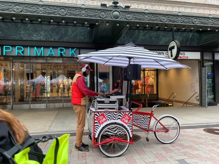 A Trike Called Funk playing tunes for the Bike to Work Day celebrations from his red, white and black trike.