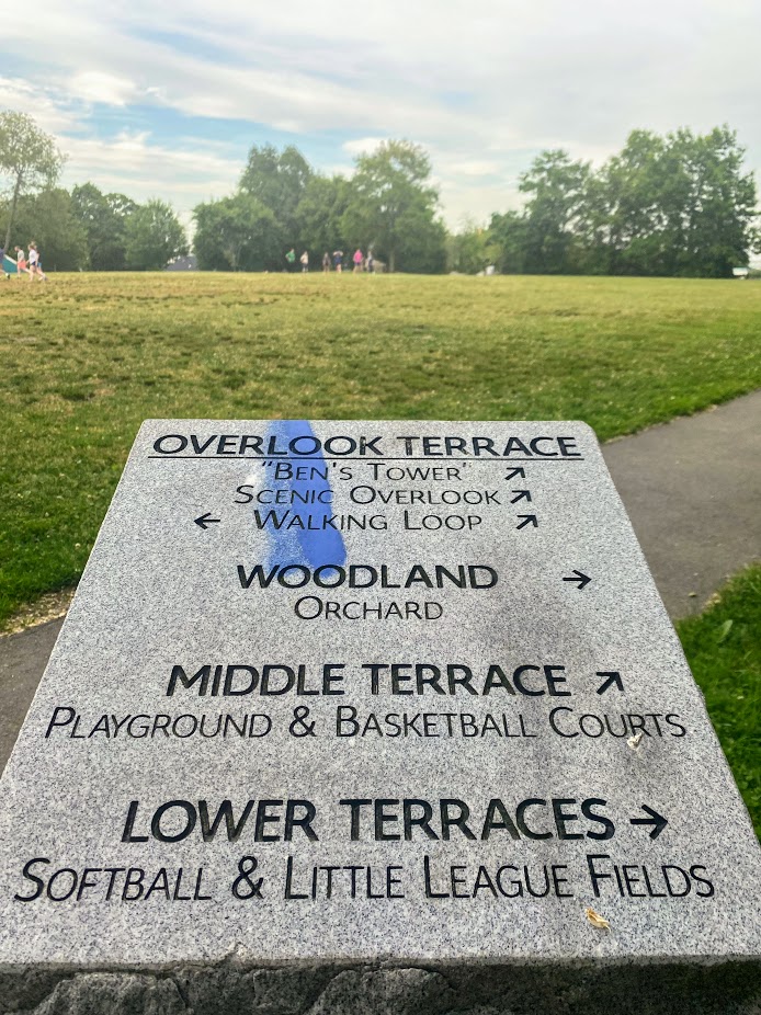 stone wayfinding sign at McLaughlin Playground in Mission Hill
