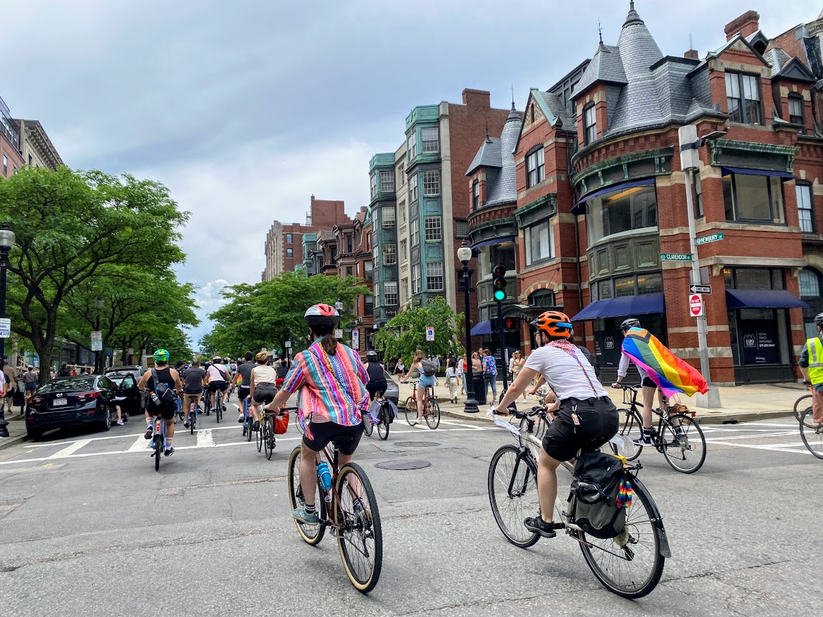 bicyclists Rolling down Newbury Street where the group received a warm welcome from folks out shopping and dining.