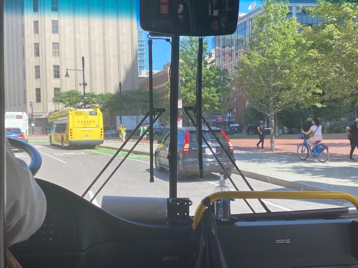 Our shuttle bus pulling into Government Center, where an idling car was parked in our spot; I wondered if drivers had any idea of today’s events.