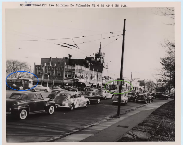 cars and trolleys sharing Blue Hill Avenue