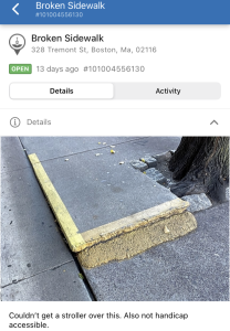 a screenshot of Boston's 311 app showing a report of a broken sidewalk next to a tree.