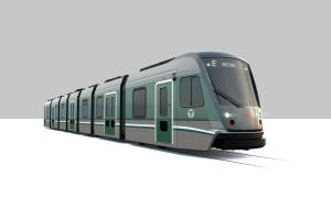 A rendering of a new Green Line light rail vehicle on a grey background. The train is segmented with a low floor and a T logo on its side