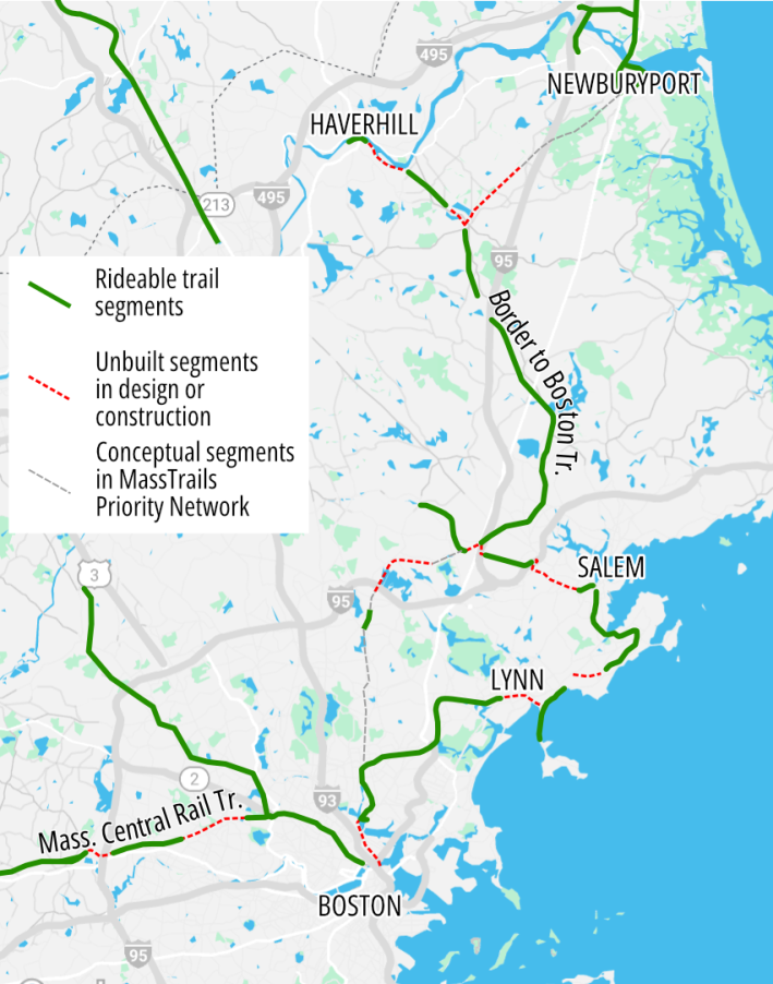 An overview map of the Border to Boston trail network, stretching from Newburyport in the north (upper right) to Boston in the south (lower center). Gaps in the trail network are designated in red dotted lines for projects in progress and gray dotted lines for conceptual future trail projects.