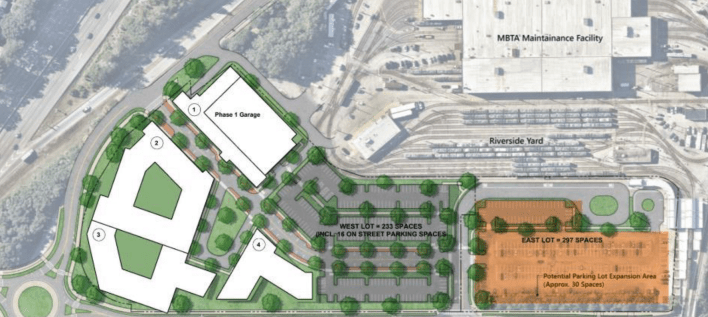 A birds-eye-view site plan for the proposed Phase 2 Riverside redevelopment. The image shows several residential buildings on the western edge of the site, plus a parking garage abutting the MBTA Green Line maintenance facility. An existing MBTA surface parking lot occupies the center and eastern end of the site closer to the Riverside MBTA station.