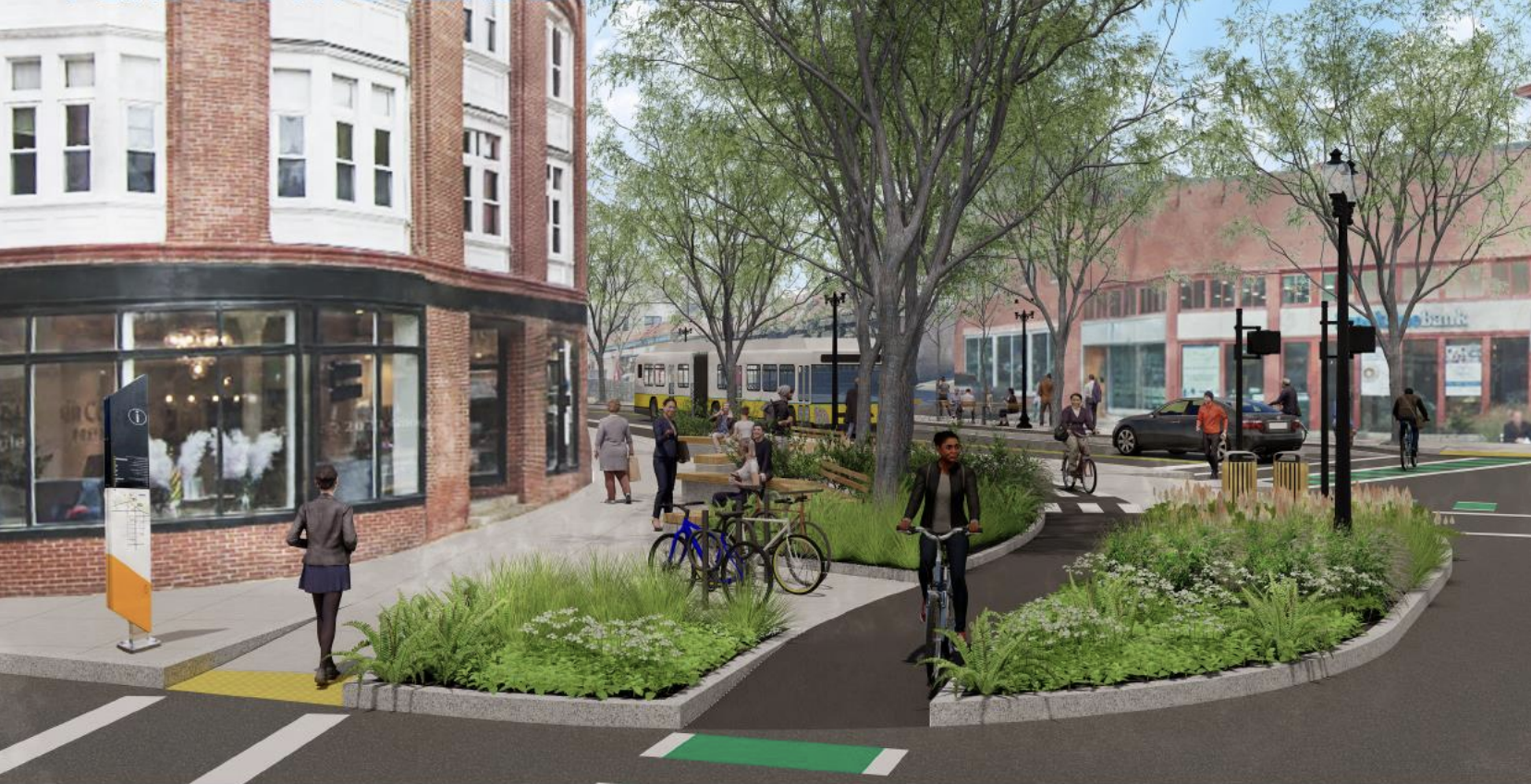 A rendering of a city intersection with an older multi-story brick building to the left, a sidewalk, and a bike lane running through a landscaped plaza with trees in the foreground.