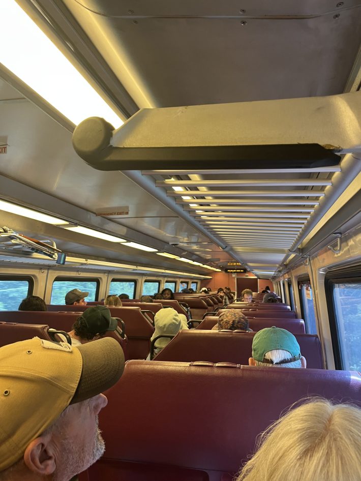 Passengers on the Commuter Rail train sit back and enjoy the ride to Rockport.