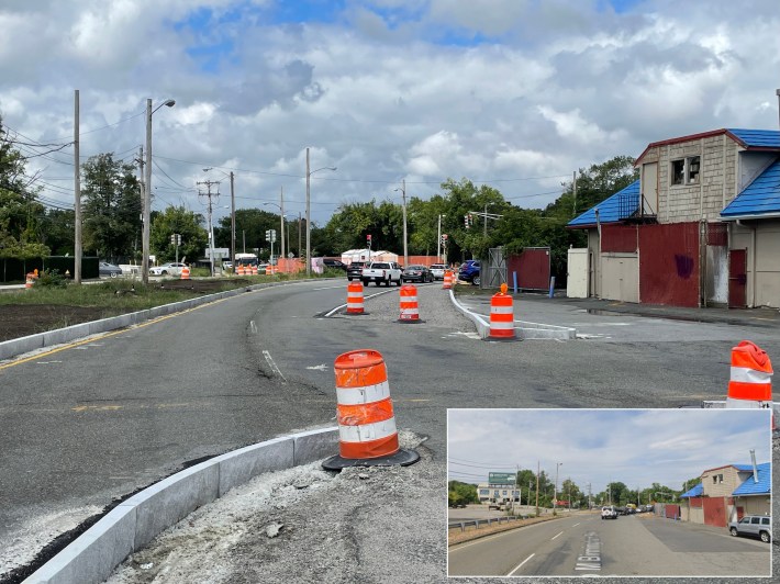 A highway construction site. New granite curbs have been installed in the middle of an older roadway with a run-down building with a blue-tiled roof visible to the right. Several orange construction barrels dot the roadway. An inset at lower right shows what the same scene looked like before construction, when the same view showed a wide multi-lane roadway next to the same building.