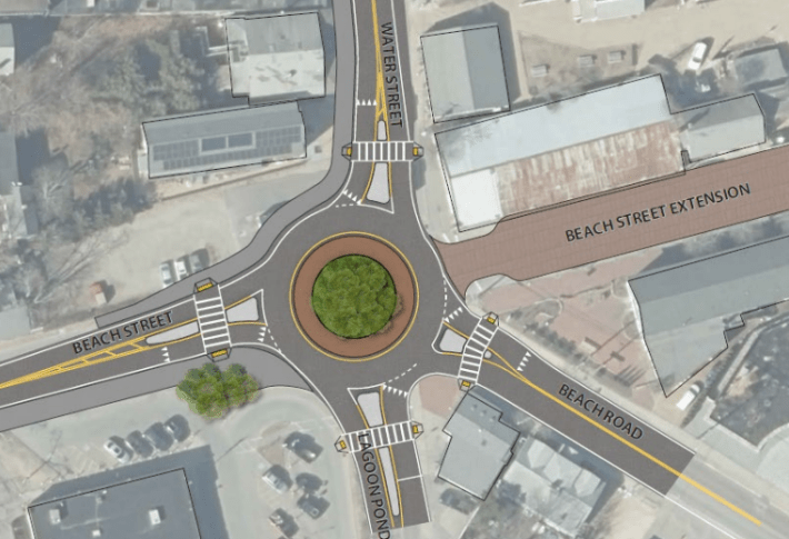 Aerial map rendering of the Five Corners intersection in Vineyard Haven, redesigned as a roundabout. The roundabout connects Beach Street, Water Street, Beach Street Extension, Beach Road, and Lagoon Pond Road. Pedestrian crosswalks, and lane markings are included.